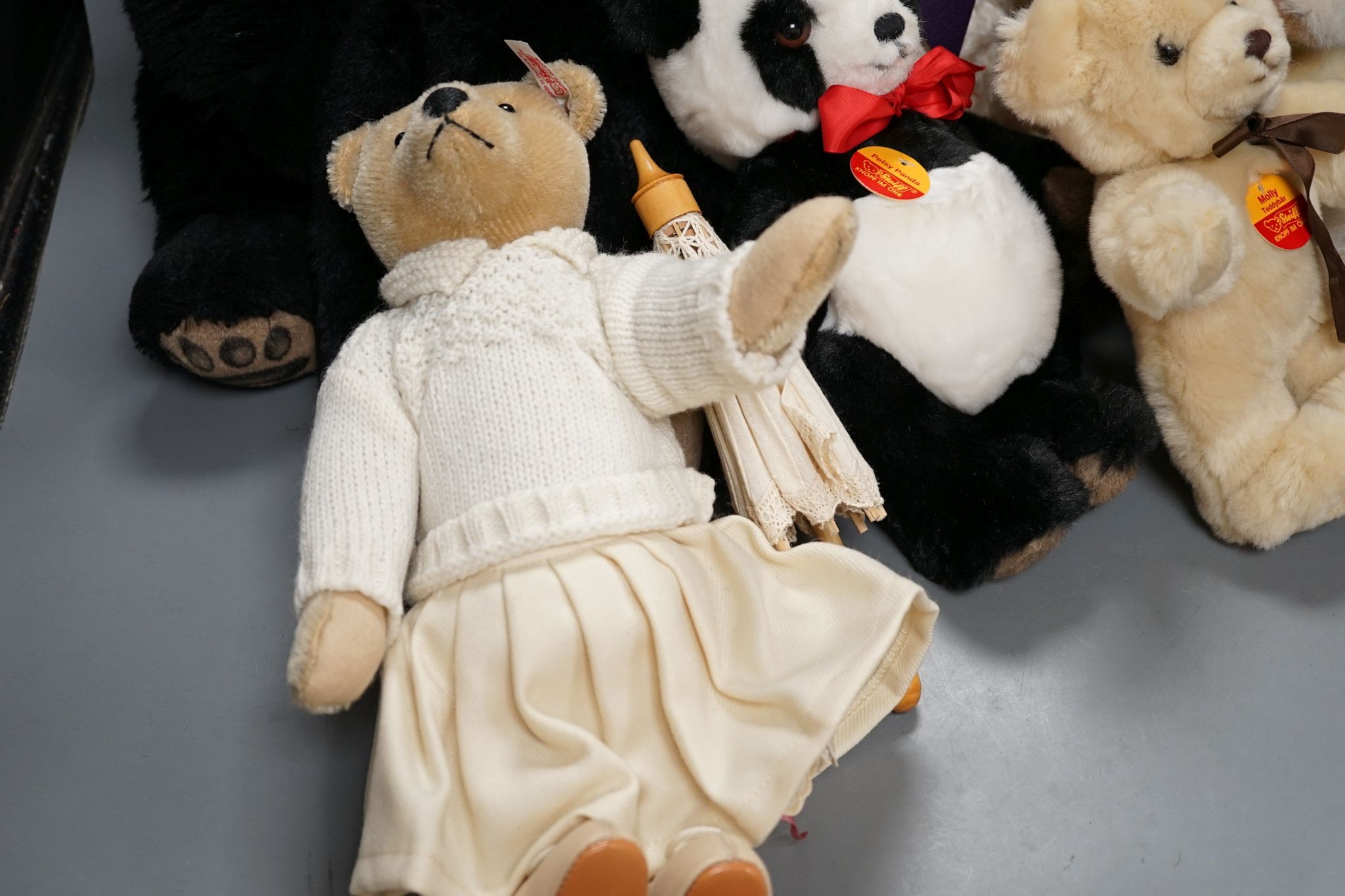 Four post war Steiff animals with a 'Pat and Nora' Limited Edition Steiff with parasol but no box and a white Limited Edition Steiff bear with white label for Hamleys